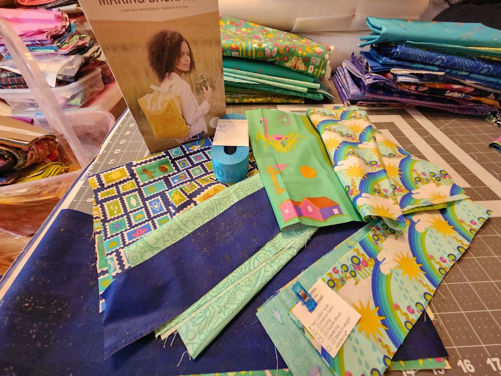 Supplies for my Making Backpack including Alison Glass Postage fabrics