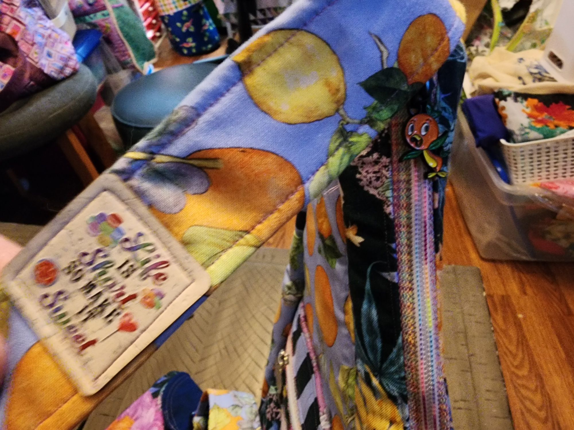 details - cork tag & Orange bird zipper pull